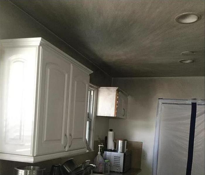 kitchen covered in soot