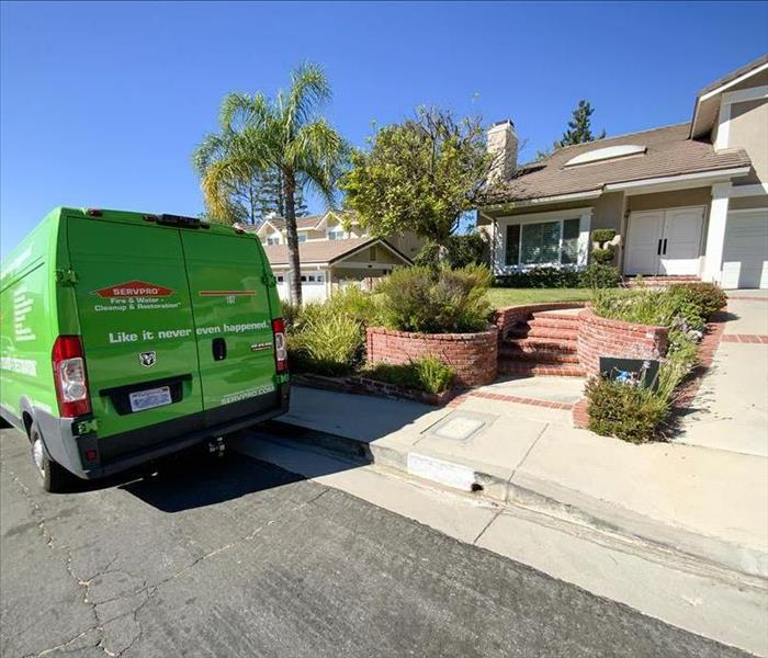 SERVPRO truck outside of a home